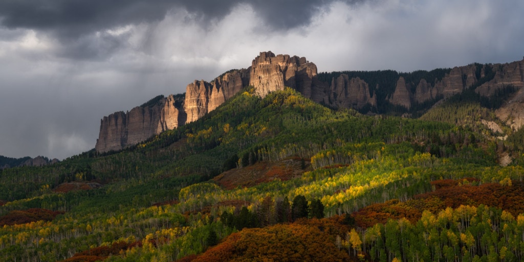 Light breaking through storm clouds during autumn in the San Juan mountains of Colorado