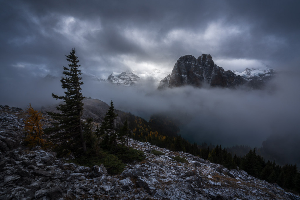 Sunburst Peak poking out of the fog after a fresh autumn snow in Canada