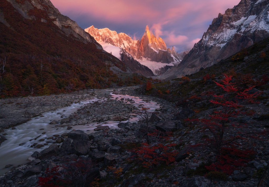 Cerro Torre catches alpenglow far before sunrise in El Chalten, Argentina